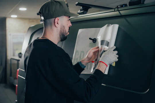 Vehicle customization and car wrapping in progress