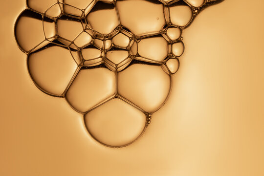 Close-up view of soap bubbles forming a unique pattern