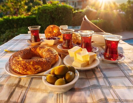 Traditional turkish breakfast spread serving simit bread and tea