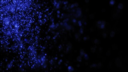 Obraz premium Blurred blue abstract background of bokeh and small round particles of energy magical holiday flying dots on a black background