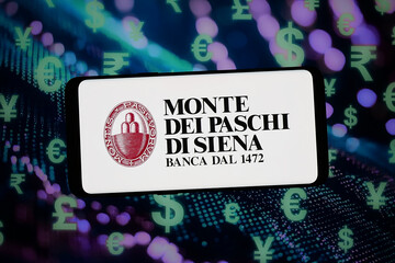 Fototapeta premium Stuttgart, Germany - 02-09-2026: In this photo illustration, the logo of Banca Monte dei Paschi di Siena S.p.A. (MPS) is displayed on a smartphone in front of abstract background on computer screen.