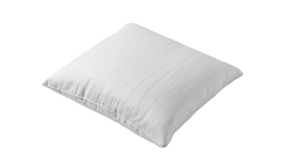 A single white square pillow with soft edges is presented at an angle casting a slight shadow on the surface below it white background cutout