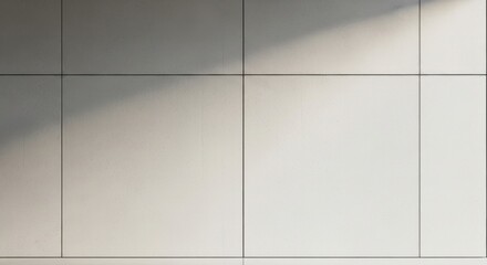Modern concrete wall with geometric shadow pattern and clean lines