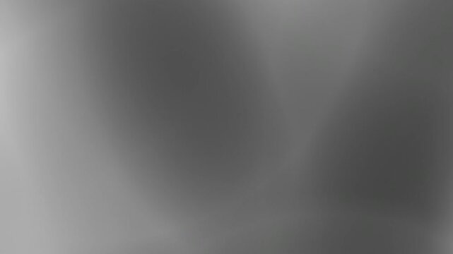 A simple gray gradient background animation plays smoothly in a modern digital environment from a front viewpoint.