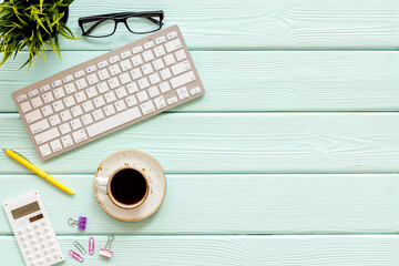 Workspace on top view with keyboard and cup of coffee. Education online. Home office.