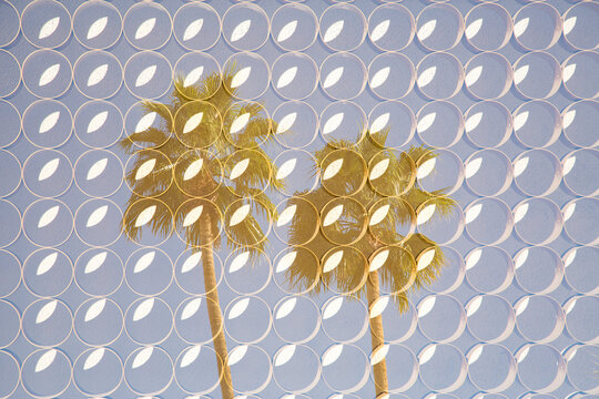Palm Springs, California, USA. Double exposure mid century glass with palm trees. Artistic interpretation. 