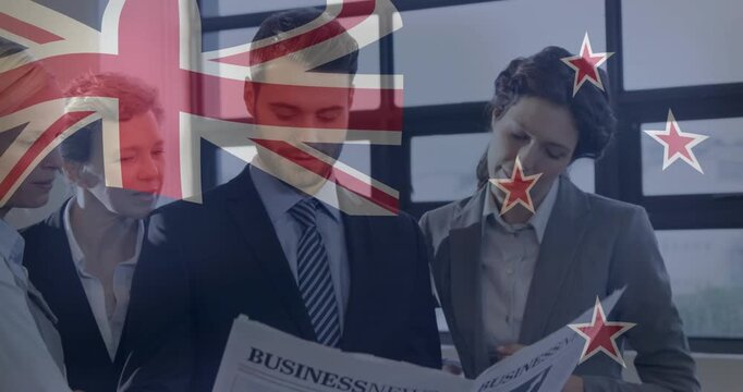 Man holding BUSINESSNEWS paper leading team reviewing headlines, women pointing, NZ flag overlay