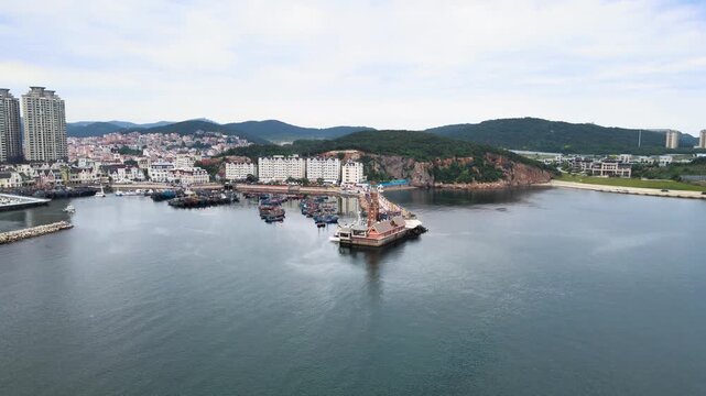 Dalian Fisherman's Wharf Aerial View with Coastal City and Mountains