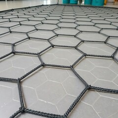 A mesh formed from multiple hexagons interconnected with fine li