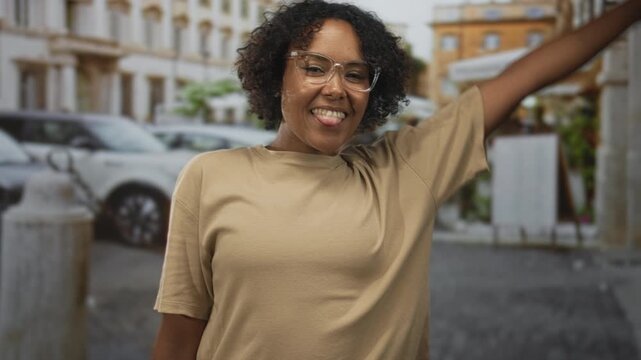Woman spread arm on street with beige shirt and glasses; teasing fun.