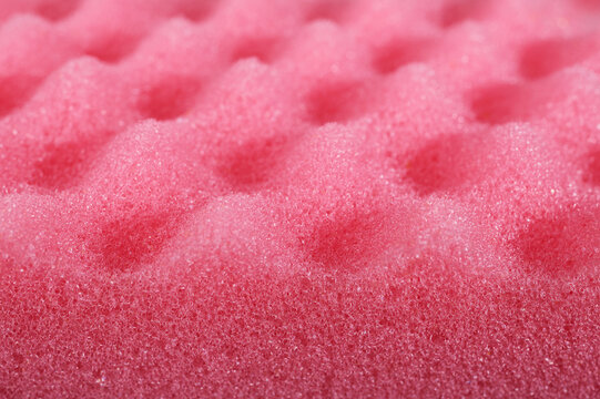 Pink acoustic foam showing soft and absorbent bubbly texture
