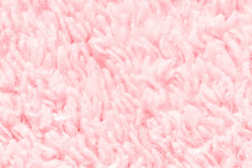 Soft pink furry texture background for cozy and warm designs. © elenavolf