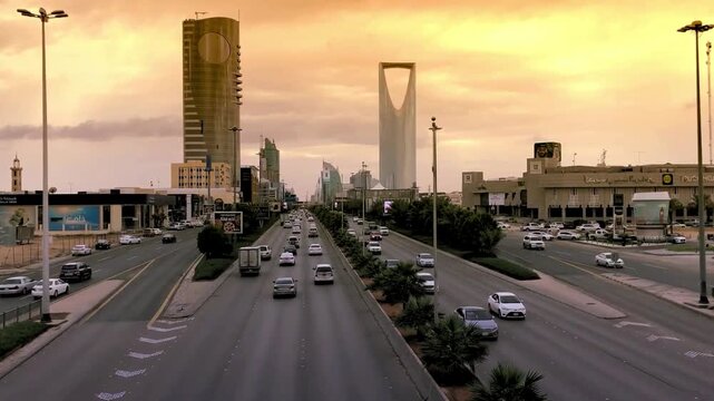 Stunning Drone shot King Fahd Road in Riyadh capital city of Saudi Arabia. aerial panoramic view of the Riyadh skyline and architecture of the King Abdullah Financial District.