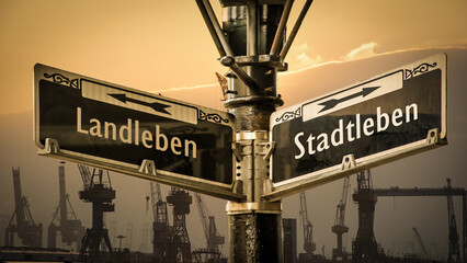 Signposts the direct way to city life versus country life