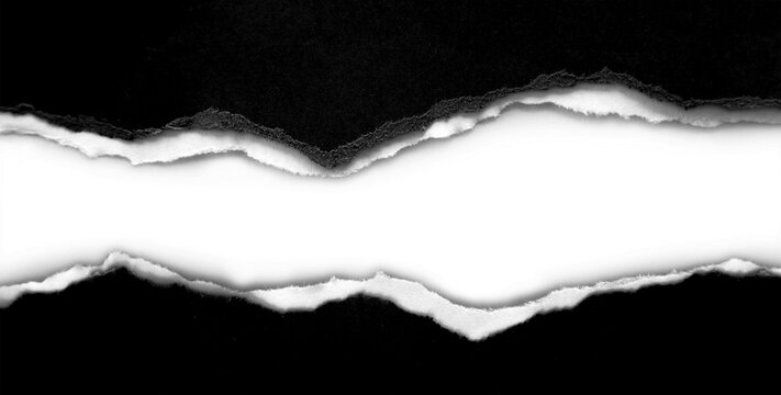 Gap in ripped black paper on white