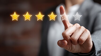 Hand of a Business Professional Touching Star Icons on a Screen, Representing Customer Satisfaction and Feedback in a Corporate Environment with a Blurred Background