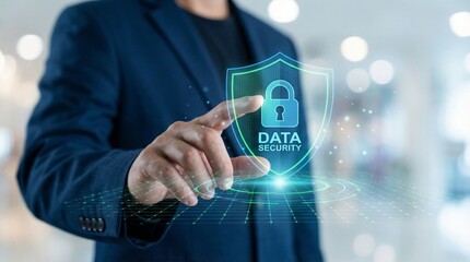 Businessman Touching Virtual Shield with Lock Icon Symbolizing Data Protection in Modern Office