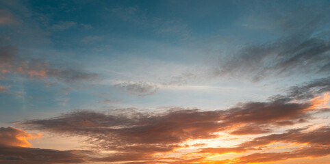 Beautiful colorful sunset with orange clouds. Sky background.