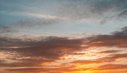 Beautiful colorful sunset with orange clouds. Sky background.