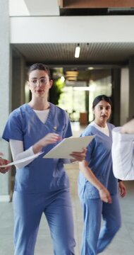 People, nurse or medical team with documents for internship, surgery or emergency in hospital. Group, healthcare worker or interns with doctor or paperwork for clinic training, practical or residency
