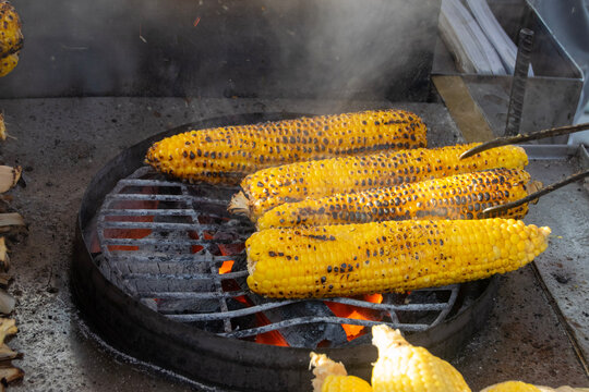 Grilled corn on the barbecue with smoky aroma
