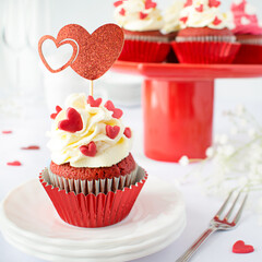 Valentine Red Velvet Cupcakes with Cream Frosting and Heart Decorations