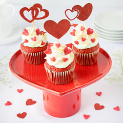 Valentine Red Velvet Cupcakes with Cream Frosting and Heart Decorations