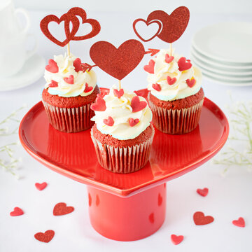 Valentine Red Velvet Cupcakes with Cream Frosting and Heart Decorations