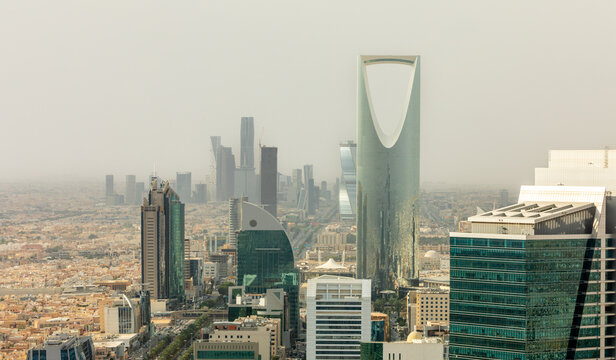 Modern cityscape with futuristic high rise architecture, corporate towers and dense urban downtown development representing economic wealth, Al Olaya, Riyadh, Saudi Arabia