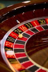 Roulette Wheel with Ball in Luxury Casino