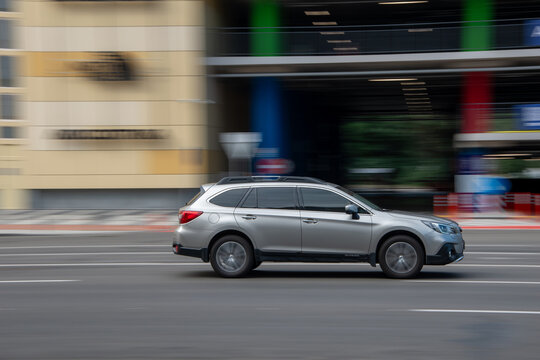 Ukraine, Kyiv - 29 July 2021: Silver Subaru Outback car moving on the street.