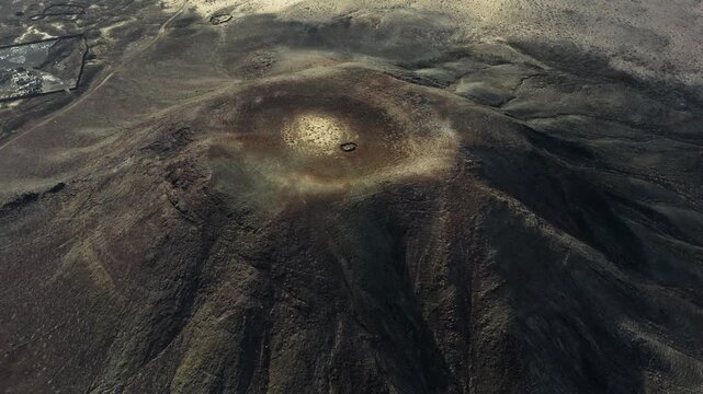 Aerial view over La Mancha crater in the volcanic Area of the Bayuyo, on the Island of Fuerteventura, Spain.
