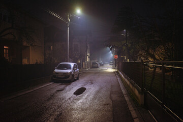 Night scene of a street in the Balkans during winter without snow