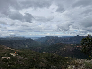  Mountainous landscape with storm clouds and nature trails