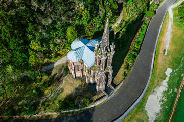 Old chapel of Our Lady of Victories by the lake Furnas, aerial view. Sao Miguel island Azores