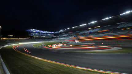 Night illuminated racing track asphalt surface turn on motion blur