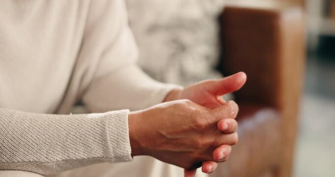 Thinking, anxiety and hands of woman on sofa with worry for decision, stimming and overthinking in home. House, lounge and person with anxious, nervous and unsure of future, mental health and stress