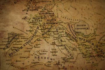 Vintage style map of Early Medieval Europe, circa 6th century AD, showing post-Roman kingdoms like Visigoths and Franks. Antique parchment texture, historical and geopolitical concept.