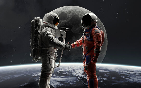 Two astronauts from different eras shaking hands, symbolizing the connection between historic and modern lunar exploration missions - Artemis and Apollo