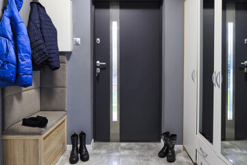 Entrance to the house with gray hall