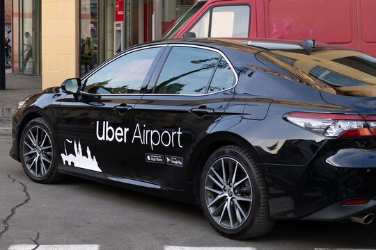 Prague, Czechia - Jan. 20, 2025: Uber Airport vehicle offers rides from Vaclav Havel Airport Prague.