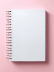 Blank notebook spiral notebook white page pink background office supply school stationery minimal design writing pad copy space top view blank notebook pink background with white page and spiral