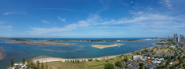 Aerial outlook across bay from Southport on Gold Coast to distant horizon