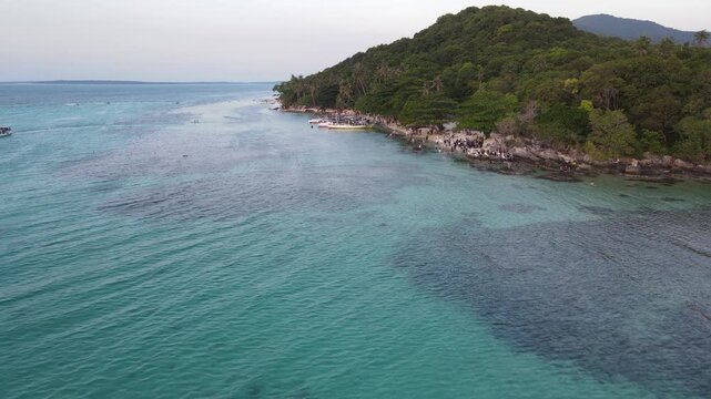 Aerial view of remote island in Karimunjawa Islands, Jepara, Indonesia. Coral reefs, white sand beaches. Top tourist destination, best diving snorkelling.