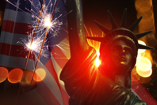 Statue of Liberty, firework, burning sparklers and flag of USA. Greeting card or poster design for national American holiday