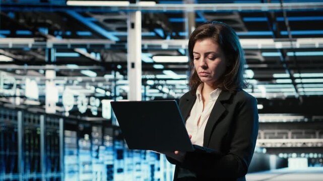 Creating digital twin scan, laptop and admin in data center optimizing server load balancing. Adjusting system parameters, augmented reality visualization and IT specialist in server farm, camera B