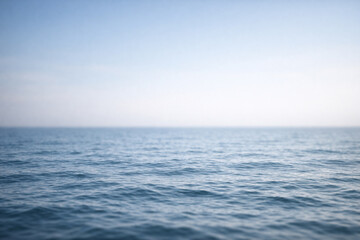 Obraz premium AI generated calm empty sea with distant horizon conveying solitude loss and quiet reflection soft natural light smooth water texture minimal composition with wide copy space