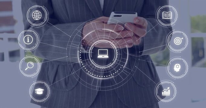 Female biz exec bringing phone into view, tapping and activating HUD laptop dashboard for analytics