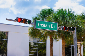Ocean Drive Road Sign with Palm Trees in Background, Miami Beach, Florida. Selective focus.