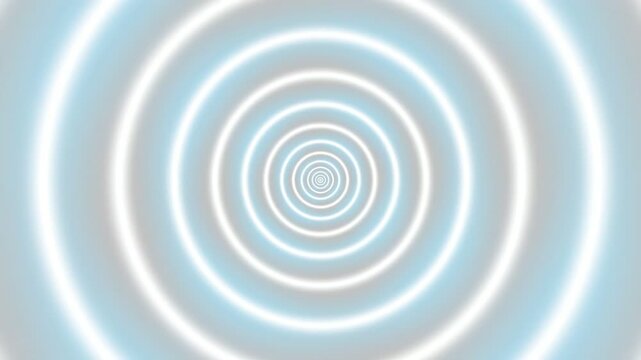 Wide shot of glowing concentric circles forming a light tunnel illusion
